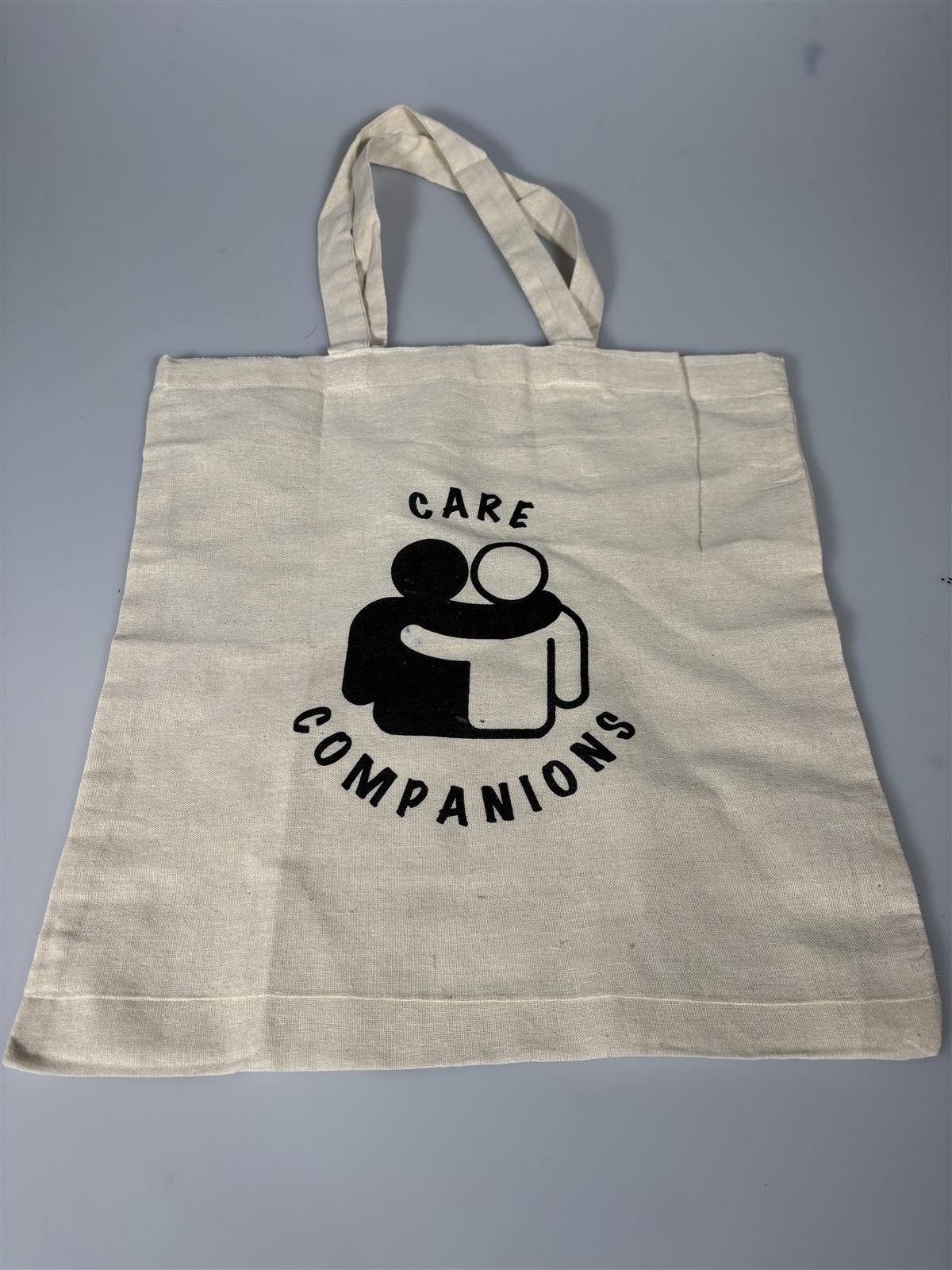 Care Companions tote bag, black logo on natural canvas
